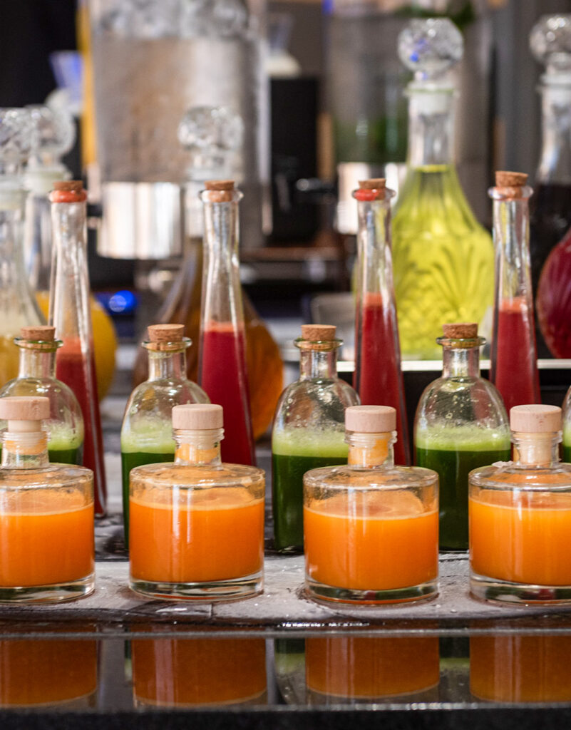 Fresh juices in elegant glass bottles at Bread & Spread